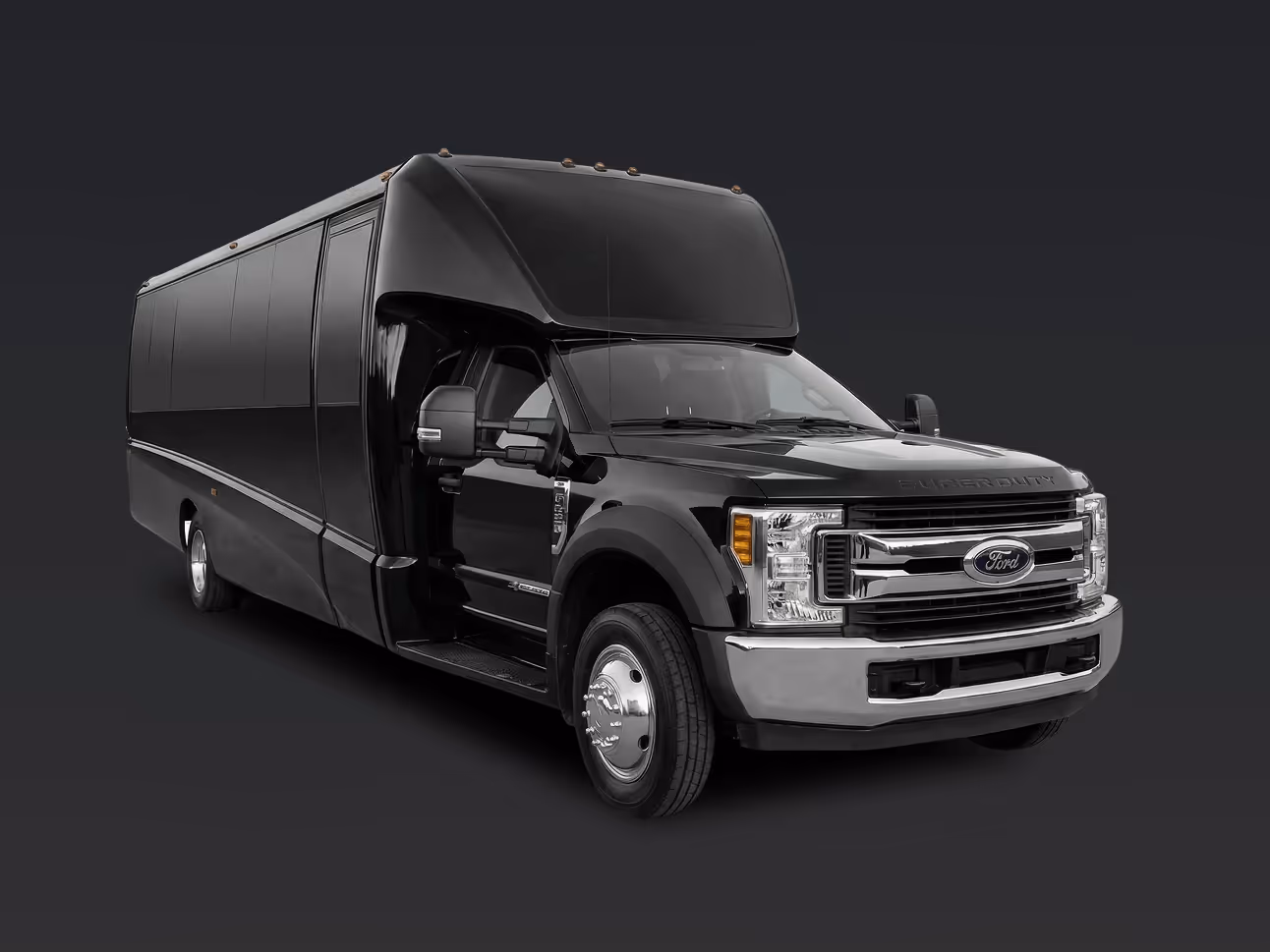 Side view of a black executive mini bus for large group charters.